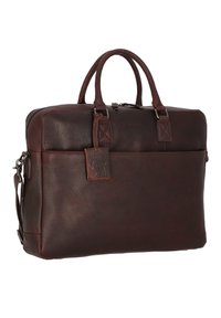 Braune Ledertasche mit strukturiertem Finish, doppelten Griffen, abnehmbarem Schultergurt, Reißverschlussverschluss und angehängtem Lederschild.