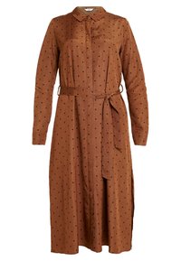 Braunes langärmliges Kleid mit schwarzen Polka-Dots, Knopfverschluss vorne, Kragen und passendem Taillengürtel. Verfügt über seitliche Schlitze für mehr Komfort.