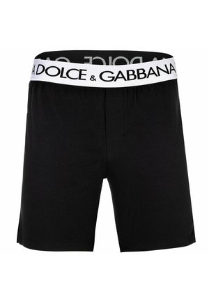 Zwarte herenboxershorts met een witte tailleband met daarop de tekst "Dolce & Gabbana" in vetgedrukte zwarte letters.