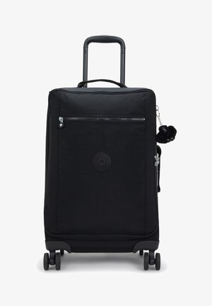 Black suitcase with a textured fabric exterior, retractable handle, four wheels, front zipper pocket, and a round logo patch. Includes a decorative keychain.