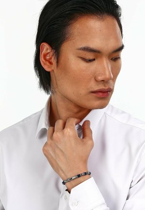 Bracelet - blauw zilverkleurig