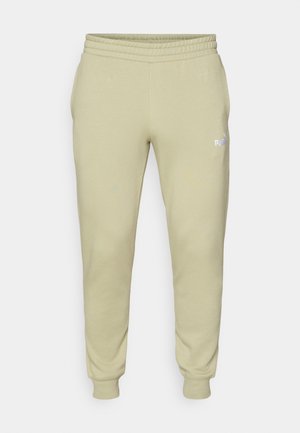 Pantalones de chándal de mezcla de algodón verde claro con cintura y puños elásticos, con un logo blanco en el muslo izquierdo.