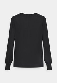 Black long-sleeve blouse with a round neckline, featuring puffed shoulder seams and buttoned cuffs. Smooth, lightweight fabric.