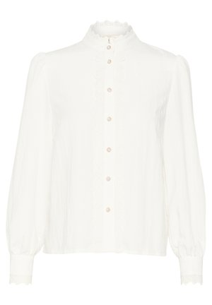 Witte blouse met een hoge kantkragen, lange puffmouwen en een golvende afwerking aan de voorkant. Zes knopen in een rij in het midden.