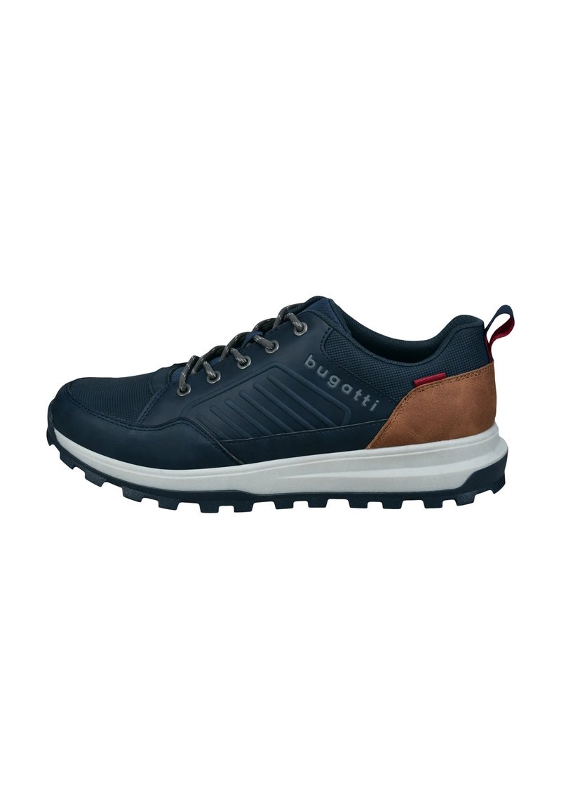 Navy blue athletic shoe with textured fabric and leather accents, silver eyelets, and a rugged black sole. Features a red pull tab at the back.