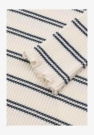 Kremowa bluzka z żeberkowej dzianiny z granatowymi poziomymi paskami. Posiada falbanki na końcach rękawów oraz teksturowane wykończenie.