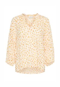 Blouse légère crème avec un col en V, manches 3/4, et motif orange en forme de feuilles ; encolure froncée et ourlet légèrement incurvé.