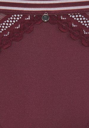 Burgundy stretch fabric with intricate lace detailing and a small silver accent at the waistband. Smooth texture with a fitted design.
