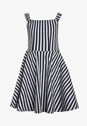 Robe sans manches avec des rayures verticales bleu marine et blanches sur le corsage et des rayures diagonales sur la jupe évasée.