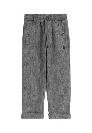 - Spodnie materiałowe