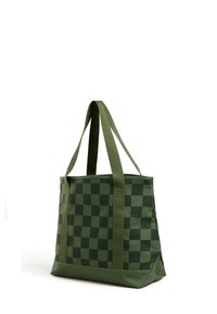 Zielona torba na ramię w kratę, wykonana z wytrzymałej tkaniny, wyposażona w solidne zielone paski, o prostokątnym kształcie i płaskiej podstawie.