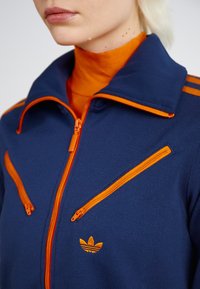adidas Originals MONTREAL  - Camisola com fecho - night indigo
