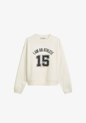 Kremowy sweatshirt z okrągłym dekoltem, długimi rękawami i wyraźną czarną grafiką "JESTEM SPORTOWCEM 15" na przodzie.