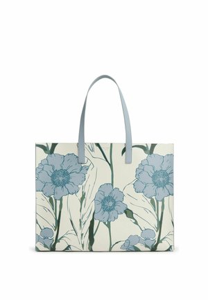 Large rectangular tote bag with light blue floral print and green stems on a cream background and light blue handles.