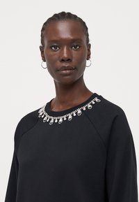 ONLY Tall ONLJETT O NECK  - Melegítőfelső - black