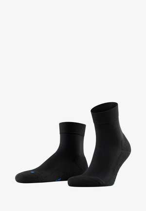 Czarne skarpetki do kostek z prążkowanym mankietem, wzmocnioną piętą i palcami, teksturowanym materiałem oraz kontrastującymi niebieskimi detalami na podeszwie.