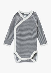 Body a maniche lunghe a righe in navy e bianco con chiusure a scatto e design avvolgente. Realizzato in tessuto morbido con scollatura rotonda e rifiniture in contrasto.