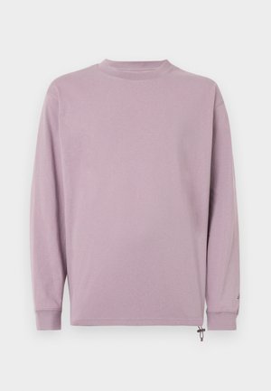 Lange mouwen shirt van zachte lavendelkleurige stof. Heeft een ronde hals, een relaxte pasvorm en een verstelbare zijzoom met een trekkoord.