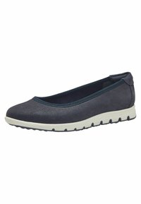 Des baskets slip-on bleu marine avec un dessus texturé, un col élastique et une semelle blanche légère dotée de rainures de traction.