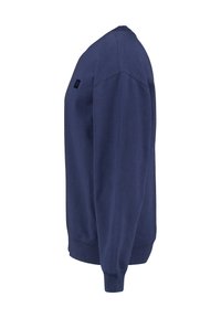 Navy blue sweatshirt, cotton blend, crew neck design, ribbed cuffs and hem. Features a small logo on the chest. Smooth texture.