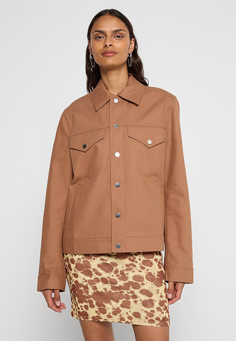 Nanushka Lichte jas bruin