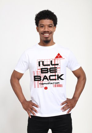White cotton t-shirt featuring black and red graphic text, "I'LL BE BACK," with a patterned background and logo accents.