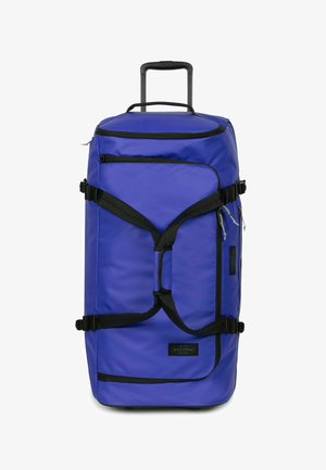 Rolle-Duffel-Tasche in leuchtendem Blau. Aus strapazierfähigem Stoff gefertigt, mit schwarzen Trägern, Griffen und Reißverschlüssen. Rechteckige Form mit verstärkten Akzenten.