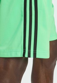 adidas Originals FIREBIRD - Tracksuit bottoms - screaming green   black