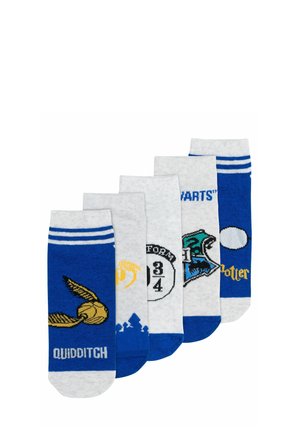 Five pairs of Harry Potter-themed socks displaying Quidditch golden snitch, Hogwarts letter, Platform 9 3/4, Ravenclaw crest, and themed text.