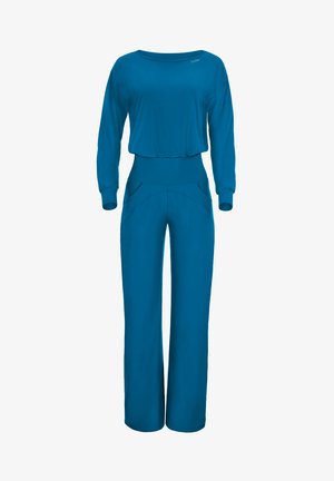 Modré, dlhé overal s uvoľneným strihom, s širokými nohavicami a bočnými vreckami. Vyrobené z mäkkého, elastického materiálu.