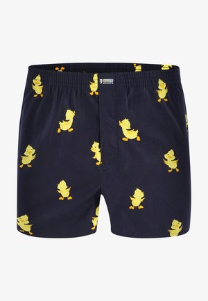 Laivansiniset bokserit, jotka on valmistettu puuvillasta ja joissa on toistuva keltainen ankka-kuvio, joustava vyötärö ja rento istuvuus mukavuutta varten.