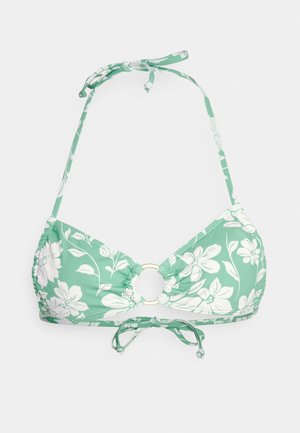 Green floral bikini top with a triangular shape, featuring a gold ring detail at the center and ties at the neck and back.