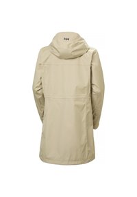 Imperméable long beige à capuche avec une couture arrière, une taille élastique et un petit logo noir "HH" sur la capuche.