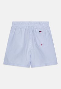Svetlomodré pruhované plážové šortky s elastickým pásom. Obsahujú zadnú vrecko s malým logom. Hladký povrch.
