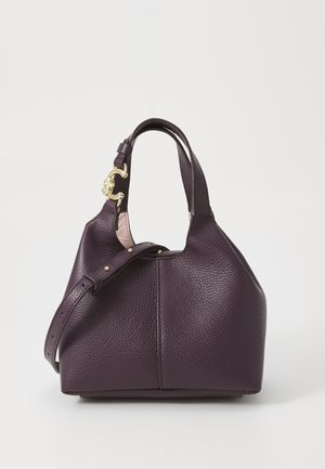 Purple leather handbag with grainy texture, structured shape, short handle, and adjustable strap. Gold hardware accent.