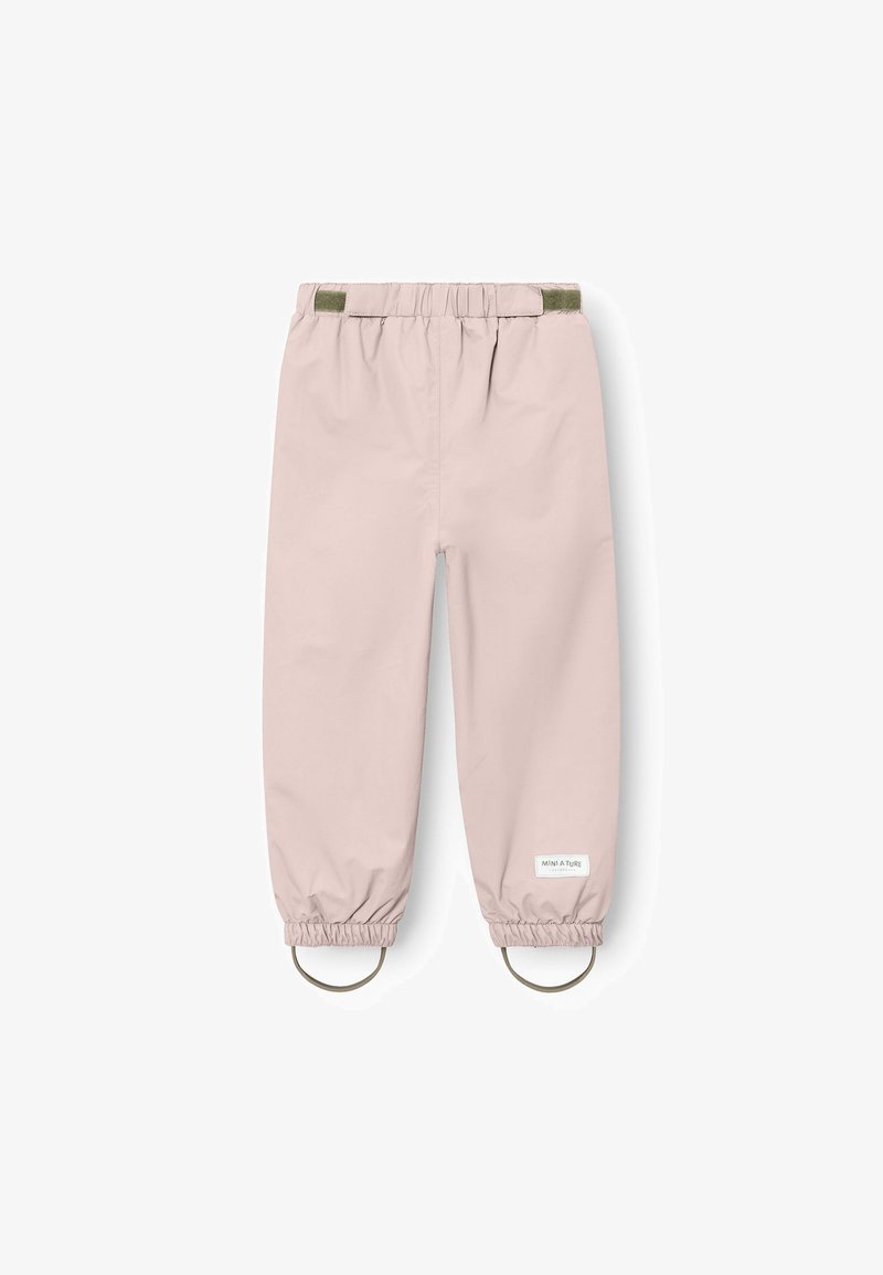 Lys rosa vandtætte bukser med elastisk talje, samlede manchetter og to runde hardware detaljer ved anklerne. Minimalistisk branding på siden.