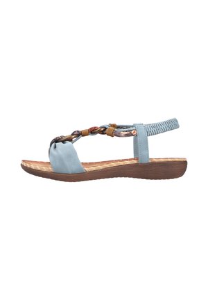 Sandale plate bleu clair avec bride arrière élastique, bride avant tressée avec détails en bois et cuir, et semelle marron texturée.