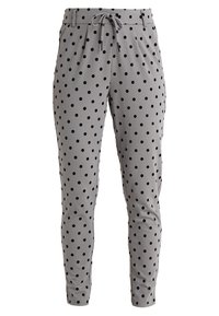 Grijze polkadotbroeken in een lichte stof, met een verstelbare taille, slim fit en zwarte cirkelvormige patronen overal.