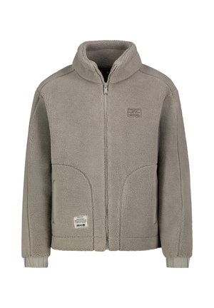 Beige Fleecejacke zum Zuziehen mit hohem Kragen, zwei Seitentaschen, elastischen Bündchen und kleinen rechteckigen Marken-Patches auf der Brust und unten vorne.