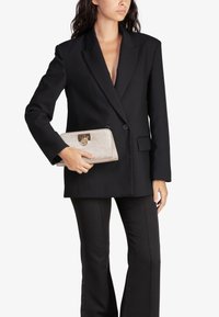 V73 Pochette - color oro