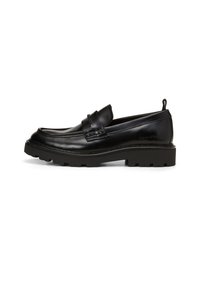 Zwarte leren loafers met een stevige rubberen zool, met een ronde neus, gestikte details en een klein lusje aan de hak.