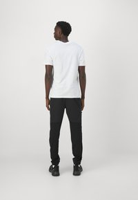 Adidas Terrex XPERIOR PANTS - Spodnji deli trenirk - black