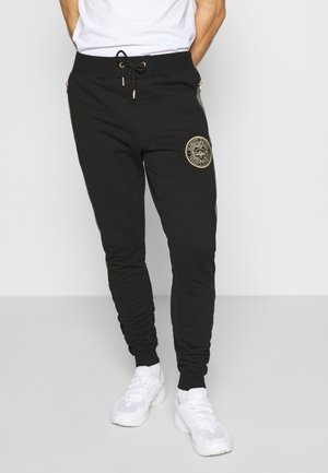 Pantalon de survêtement - black
