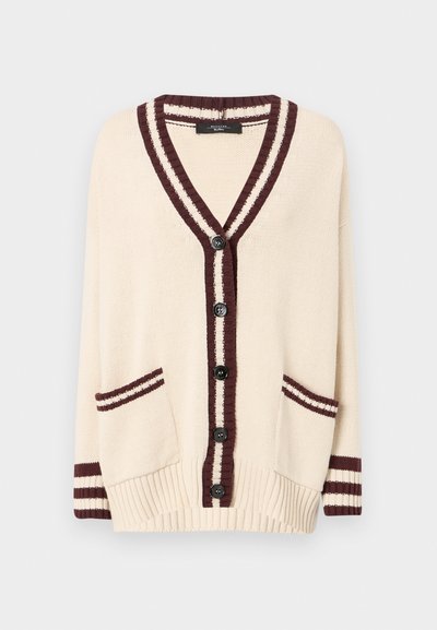 Kremfarget cardigan med dyp V-hals, mørkerød stripebånd og seks svarte knapper. Har to frontlommer og ribbestrikkede mansjetter.