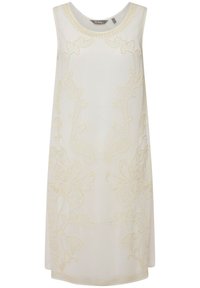 Vestido sin mangas blanco con intrincados bordados en crema de patrones florales y de hojas en la parte delantera y un cuello redondo.