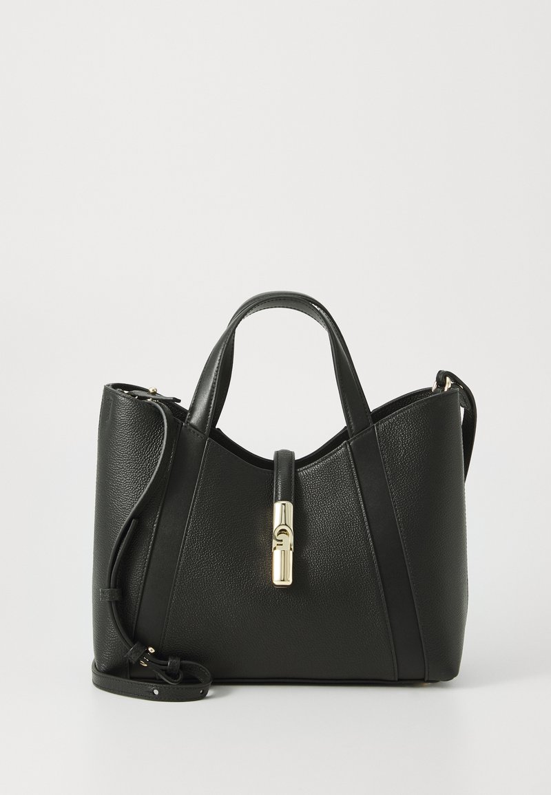 Black leather handbag with a structured shape, featuring a gold-tone hardware clasp and a detachable strap for versatility.