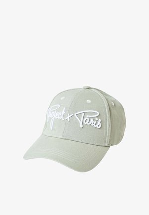 Light gray baseball cap with white embroidered text "Répet x Paris" on front, six-panel design, and curved brim.