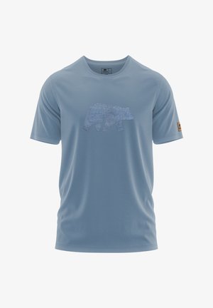 T-shirt azzurro chiaro a maniche corte realizzato in tessuto morbido, con una grafica testurizzata di un orso in silhouette di un blu più scuro, e logo sulla manica.