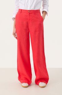 Rode linnen wijde broek met een hoge taille, voorzien van een knoopsluiting. Gladde textuur, lichtgewicht stof en een ontspannen pasvorm.