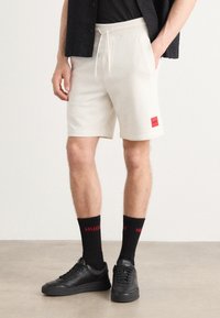 HUGO - DIZ - Pantaloni sportivi - natural Immagine in miniatura 1